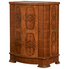 an old wooden cabinet with carvings on it