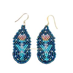 Shades of teal, green and blue make these unique earrings stand out.  Reminiscent of a medieval tapestry, a pink tulip emerges from a sea of teal.  Making earrings is my passion. Each bead is carefully hand selected and woven with love and happiness. I hope you feel the same when you wear a pair of them, too. Features: Gold plate ear wires. Woven with micro-fused braided bead thread for extreme durability. Superior Japanese glass seed beads for exceptional quality and durability. Each bead woven with positive energy and love just for you. Dimensions: 1.75 inches length x 0.75 inches wide Earrings Stand, Medieval Tapestry, Earring Stand, Shades Of Teal, Artisan Earrings, Love And Happiness, Making Earrings, Pink Tulips, Glass Seed Beads