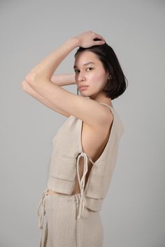 Looking for a genuine super soft and everyday top? Designed in a light silhouette, sleeveless Mia Side Ties Top can be worn with ease all summer long and compliments most body types with adjustable side-ties. - 100% Turkish double layered gauze cotton - Side slits tied with adjustable side-ties.- Crop top finish at waist Tie Crop Top, Gold Stripes, Tie Top, Fashion Labels, Body Types, Sustainable Fashion, Oatmeal, Full Length, Tops Designs