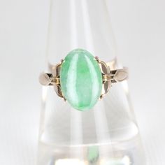 A classic 9 carat yellow gold oval cabochon Jade claw mounted dress ring, with an 9 carat yellow basket under gallery on a solid 9 carat yellow gold band. Jade: 12.5 x 8.4 x 2.0 mm approx   Weight: 2.1 grams Ring Size: M 1/2  - 6 1/4 Condition: Please refer to all images for overall condition. Should you have any questions, please don't hesitate to contact me SHIPPING IN AUSTRALIA If you would like to reduce your shipping costs, please let me know as I can send your items via standard post and i Formal Oval Cabochon Emerald Ring, Formal Emerald Cabochon Ring, Classic Oval Opal Ring With Polished Finish, Classic Opal Ring With Polished Oval Cabochon, Classic Opal Ring With Oval Cabochon And Polished Finish, Oval Cabochon Signet Ring For Formal Events, Oval Cabochon Signet Ring For Formal Occasions, Formal Oval Cabochon Opal Ring, Elegant Green Opal Ring With Oval Cabochon