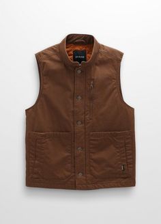 This Organic Cotton Canvas Vest Features The Perfect Amount Of Insulation For Life On-the-go. Brown Cotton Outerwear For Outdoor Activities, Cotton Vest Outerwear For Outdoor, Cotton Vest For Outdoor Wear, Cotton Vest With Pockets For Fall, Fall Cotton Vest With Pockets, Brown Cotton Vest For Fall, Functional Cotton Vest For Outdoor Activities, Cotton Utility Vest For Outdoor Activities, Rugged Brown Vest With Pockets