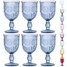 six glass goblets with different designs and colors are shown in the image, all lined up