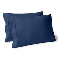 two blue pillow cases on white background