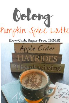 pumpkin spice latte recipe with apples and cinnamon in the middle, on top of books