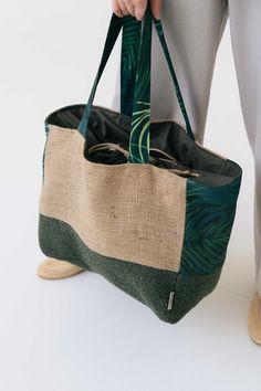 Our hand crafted bags are made with a dedication to sustainability and uniqueness. We source our coffee sacks from all over the world and upcycle them into one-of-a-kind, limited edition bags. Each bag is carefully handcrafted in Lithuania, ensuring a level of quality and attention to detail that is unmatched. Not only are our bags stylish and durable, but they also have a story to tell, as the coffee sacks they are made from have traveled from distant lands to be repurposed into something new. Join us on a journey to reduce waste and make a fashion statement with our upcycled coffee sack bags. SIZE & FIT * 39cm Width / 31 cm High/ 19cm Depth 6 pockets*  INSIDE THERE ARE 6 pockets, so your stuff will be arranged and safe.  Its carrying capacity is up to 10-15 kg. Eco-friendly Bag With Large Capacity, Sustainable Coffee, Coffee Sack, Coffee Sacks, Bag With Pockets, Limited Edition Bag, Green Beach, Holiday Bag, Sack Bag