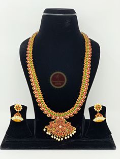 Original Design by Classical Dance Jewelry® -- Colorful And Designer Beautiful Necklace Set For Women for Parties, Engagement, Weddings, Birthdays, Bharatnatyam And Kuchipudi Dance Performances. -- Handmade Indian Item. -- This Beautiful Necklace Set Is Handcrafted In Copper Alloy Of Very Fine Quality With Imitation Pearls Of Very Fine Quality. This Necklace Set Is Coated With Gold Polish Which Give Them A Unique Look . PLEASE NOTE ❥ ALL SALES ARE FINAL ✅ ❥ No Return/ No Exchange / No Cancellati Multicolor Temple Necklace With Zari Work For Festivals, Multicolor Pallu Temple Necklace For Diwali, Multicolor Temple Necklace With Pallu For Diwali, Temple Jewelry Sets With Zari Work For Celebrations, Ceremonial Multicolor Temple Necklace For Festivals, Festive Multicolor Temple Necklace With Zari Work, Multicolor Temple Necklace For Ceremonial Festivals, Multicolor Temple Necklace With Zari Work, Multicolor Zari Work Temple Necklace