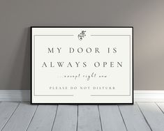 a white framed poster with the words, my door is always open except right now please don't disturb