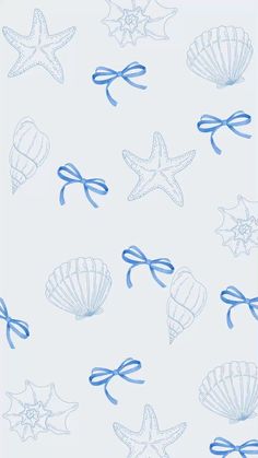 blue and white wallpaper with starfish, seashells and bows