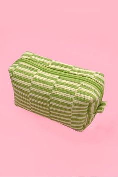 A stylish and practical solution for keeping your makeup and beauty essentials organized. This versatile pouch is designed to make a statement while ensuring your cosmetics are easily accessible, whether you're at home or on the go. Item Description: Length: 7." height: 4." depth: 3." Zip closure Green Rectangular Cosmetic Bag For On-the-go, Trendy Portable Square Cosmetic Bag, Green Rectangular Pouch For On-the-go, Trendy Square Travel Pouch, Modern Rectangular Cosmetic Bag For Daily Use, Square Portable Cosmetic Bag For Everyday Use, Square Portable Cosmetic Bag For Daily Use, Functional Rectangular Zipper Pouch For Cosmetics, Portable Square Cosmetic Bag For Daily Use