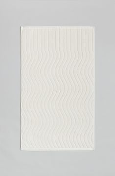 A wiggly ribbed pattern inspired by reverberations of skimmed water puts subtle texture under your feet on this soft, plush organic-cotton bath mat. 31" x 19" 100% organic cotton Machine wash, tumble dry Imported Bath Mat Ikea, Minimal Bathroom Rug, Modern Towels, Time Routine, Guest Toilet, Cotton Bath Mats, Cotton Hand Towels, Big Gifts, Guest Gifts