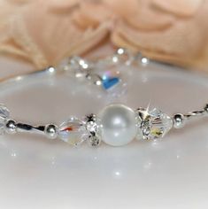 Silver and Crystal Bangle Bracelet/pearls/bridal - Etsy Fall Wedding Jewelry, Bracelet Pearls, Simple Silver Jewelry, Crystal Anklet, Pearl Bridal Jewelry, Swarovski Crystal Bracelet, Beach Bridal, Sterling Silver Bangle Bracelets, The Bangles