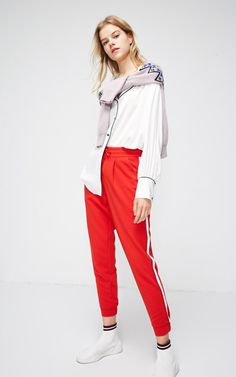 Length: Full Length Material: Polyester Material: Spandex Model Number: 119150501 Pattern Type: Solid Style: Casual Pant Style: Pencil Pants Closure Type: Drawstring Front Style: Flat Waist Type: Mid Gender: Women Fit Type: Loose Decoration: None Applicable age: The age of 18 to 24 High female trousers: Natural waist Item no: 119150501 Year season: Spring 2019 Thickness: Routine Unique Design: Contrasting printed creases, Elasticized cuffs, Buckle & zip fly Spring Stretch Elastane Sweatpants, Sporty Elastane Pants For Spring, Red Stretch Sweatpants For Spring, Spring Leggings With Elastic Waistband, Casual Pants Style, Casual Pant, Pencil Pants, Loose Pants, Formal Style