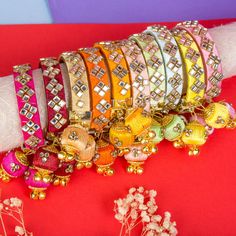 Elevate your style with our exquisite Indian Silk Thread Bangles. Expertly handcrafted with luxurious silk thread and adorned with stunning Kundan bangles, these ethnic bracelets add a touch of elegance to any outfit. Perfect for Indian weddings, these assorted Kangan with Latkan are the epitome of fashion and luxury. Free size for a comfortable fit. Material: Plastic, Silk Thread and Kundan Size: Designed as free size, these bangles offer versatility and ease of wear for women of different wris Rakhi Greetings, Holi Gift, Warm Halloween, Diwali Gift Hampers, Desi Vibes, Acrylic Rangoli, Kundan Bangles, Henna Cones, Silk Thread Bangles