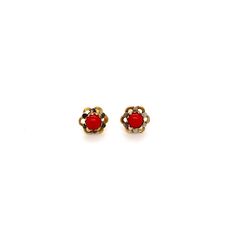 Vintage Yellow and White Gold Red Coral Stud Earrings- These red coral studs have great color and are adorable. They have a floral type design to them and the coral center makes them pop. They are white and yellow gold and are very well made. Perfect for a first or second hole they cute studs will be a go to. The inner petalks are white and the outer petals are yellow.  Red coral stones can be found in both shallow and deep waters in the Mediterranean and Red Seas, and the Pacific and Indian Oceans. It is considered a rare stone due to its limited availability, as the coral lives deep in the ocean, making it difficult to harvest. The rarity of this stone is further enhanced by the fact that it can be difficult to identify since it is found in various shapes and sizes, ranging from small pe Red Cluster Earrings For Formal Events, Formal Red Cluster Earrings For Pierced Ears, Formal Red Flower Earrings For Pierced Ears, Formal Red Flower-shaped Earrings, Elegant Red Flower Earrings For Anniversary, Elegant Red Coral Earrings, Red Clip-on Earrings For Anniversary, Red Flower Earrings For Pierced Ears, Classic Red Cabochon Earrings