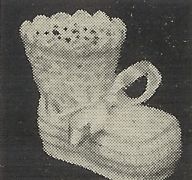 a black and white photo of a vase