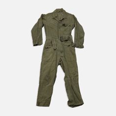 Vintage Military Jumpsuit 1960s Size: 36R armpit to armpit: 22” Vintage Jumpsuits And Rompers For Workwear, Vintage Fitted Overalls For Workwear, Retro Fitted Long Sleeve Overalls, Vintage Fitted Jumpsuits And Rompers With Pockets, Vintage Fitted Long Sleeve Overalls, Vintage Fitted Long Sleeve Jumpsuits And Rompers, Military Jumpsuit, Vintage Military, Military Jacket