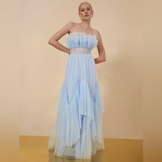 Brand: Bcbg Size: 8, 10, 12 Color: Light Blue Material: Outer 100% Polyester, Lining 88% Polyester, 12% Spandex Features: Strapless, Tiered Ruffle Skirt, Bustier Bodice, Sweetheart Neckline, Back Zipper Closure, Semi-Sheer Top. Maxi Length That Hits Below The Ankle. Partly Lined. Condition: New With Tags Occasions: Suitable For Formal Events, Weddings, And Elegant Evenings. Semi Sheer Top, Tiered Ruffle Skirt, Color Light Blue, Tulle Gown, Bcbgmaxazria Dresses, Sheer Top, Ruffle Skirt, Sweetheart Neckline, Formal Event