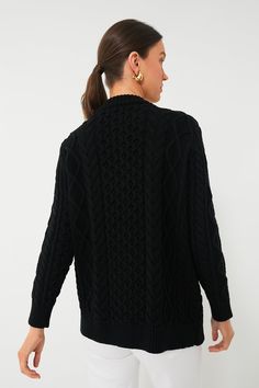 An incredibly cozy throw-on-and-go piece, the Black Cotton Abigail Cardigan is a true style staple. It's chunky without being too heavy, classic without being boring, and made in a timeless hue that will pair well with anything in your closet — plus, a slightly longer hem that hits at the top of the thigh and tonal tortoiseshell buttons act as special touches that take this silhouette over the top. We recommend wearing it anywhere and everywhere: in the office, on your next coffee date, running Being Boring, Plus And Minus, Cozy Throws, Coffee Date, Black Cardigan, Running Errands, Black Cotton, Round Neckline, The Black