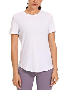 PRICES MAY VARY. Designed for low-impact workouts or daily wear. Super soft, skin-friendly and lightweight fabric keeps you comfortable. Classic fit, hip length. Classic round neck design, seamless double needle collar for comfortable fit. Basic short-sleeved shirt with a moderate length curved hem, easy to pair with any trouser. Pima Cotton collection is super soft and feels great against your skin, aiming to offer a comfortable feeling to you. Classic round neck design with long curved hem, lo Breathable Yoga T-shirt, Sporty Relaxed Fit Tops For Pilates, Relaxed Fit Moisture-wicking Activewear For Pilates, Basic Moisture-wicking Tops For Yoga, Stretch Athleisure T-shirt For Pilates, Stretch Moisture-wicking T-shirt For Pilates, Moisture-wicking T-shirt For Pilates, Casual Short Sleeve Tops For Pilates, Breathable Crew Neck T-shirt For Yoga