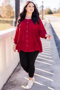 Expertly crafted, this FAB top in bold burgundy boasts functional buttons and a flowy silhouette for a versatile and stylish addition to your wardrobe! Perfect for any occasion, this top offers a touch of sophistication and effortless elegance! 100% Rayon Stylish Ladies Outfits, Burgundy Button-up Top For Fall, Fall Burgundy Button-up Tops, Chic Flowy Button-up Top, Chic Rayon Blouse With Buttons, Burgundy Long Sleeve Top With Buttons, Fall Rayon Tops With Buttons, Chic Rayon Tops With Buttons, Chic Burgundy Tops For Workwear