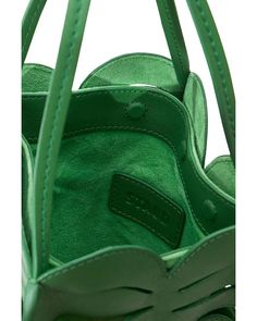 Double handles.Dimensions: 5'W x 6'D x 8.75'H.Magnetic closure.Leaf-shaped panel design.Lined.Leather.Imported.Web ID: 4733357 Designer Staud Bags For Everyday Use, Staud Leather Bag, Designer Staud Top Handle Bag, Green Leather Bucket Bag For Errands, Green Top Handle Bucket Bag For Formal Occasions, Luxury Green Bucket Bag For Shopping, Designer Green Leather Shoulder Bag, Designer Staud Leather Bags, Chic Green Leather Bucket Bag