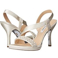 a women's white high heeled sandal with crystal embellishments