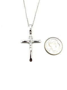 Made of 925 sterling silver with a glossy finish Neatly cut edges Classic crucifix design in an elegant pendant style Wearable with all types of clothing; casual, formal, or cocktail attire Light enough to be worn daily without discomfort Perfect gift choice for birthdays, Christmas, Easter, anniversaries and other special occasions This beautiful Silver Glossy Crucifix Necklace is perfect for any occasion. Crafted from sterling silver, this timeless piece features a high-gloss finish and classi Silver Crucifix Necklace With Brilliant Cut, Classic Silver Crucifix Necklace, Adjustable Silver Crucifix Necklace, Brilliant Cut Sterling Silver Crucifix Necklace, Fine Sterling Silver Crucifix Necklace, Catholic Cross Necklace, Catholic Necklace, Virgin Mary Necklace, Crucifix Necklace