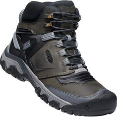 a pair of black and grey hiking boots