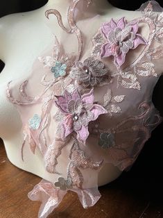 "Fine net 3D lace with embroidered flowers and leaves ... amazing dimension. This is a NEW style with MAUVE PINK embroidery, tiny sequins, and large rhinestones * Measures approximately 10.5\" x 13.5\" overall More lace, stretch lace, appliques, flowers, leaves and other lovelies located here: LACES: http://www.etsy.com/shop/MaryNotMartha?section_id=6414105 STRETCH LACES: http://www.etsy.com/shop/MaryNotMartha/search?search_query=STRETCH+LACE&search_submit=&search_type=user_shop_ttt_id_5464080&s Pink Lace Dress With Appliques, Pink Lace Dresses With Appliques, Party Lace With 3d Embroidery, Pink Embellished Lace Embroidered Fabric, Pink Embellished Embroidered Lace Fabric, Fitted Embroidered Fabric With Appliques For Party, Pink Embroidered Fabric With Floral Applique For Party, Elegant Pink Fabric With 3d Embroidery, Fitted Lace Fabric With 3d Embroidery