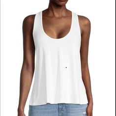 Sporty Tank Top In A-Line Silhouette Designed Solid-Hued For Versatile Styling In White. Scoopneck Sleeveless Pullover Style T-Back Polyester/Spandex Hand Wash Imported Size & Fit About 25" From Shoulder To Hem White Scoop Neck Tank Top With Built-in Bra, Casual Scoop Back Tank Top For Summer, Casual Cotton Tank Top With Scoop Back, Spring Tank Top With Built-in Bra And Scoop Back, Everyday Summer Camisole With Scoop Back, Casual Stretch Tank Top With Scoop Back, Summer Cotton Scoop Back Camisole, Chic Tank Top With Built-in Bra And Scoop Back, Summer Cotton Camisole With Scoop Back