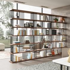 a living room filled with furniture and a book shelf