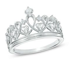 a white gold crown ring with hearts on the front and sides, set in 18k white gold