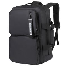 the back pack is black and has two compartments on each side, one for laptops