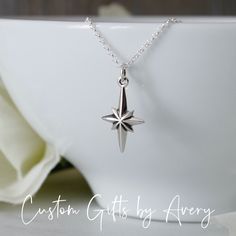 Crafted in solid .925 sterling silver  Dimensions: * 22mm high (including jump ring) * 11mm wide * 2mm high/deep Crafted in sterling silver North Star Necklace features the brightest star, Polaris. With its 3 dimensional detailing, this raised pendant makes for a beautiful minimalistic piece.  You have the option to purchase this charm on its own or ready to wear with an Italian made sterling silver box or rolo chain. Ready to wear necklace come ready for gifting in a white jewelry box with a st North Star Pendant, North Star Necklace, Star Necklace Silver, White Jewelry Box, Star Pendant Necklace, Wear Necklaces, Star Jewelry, Silver Box, Shining Star