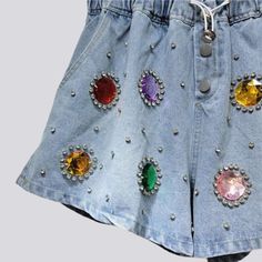 Trendy Rhinestone Jeans, Spring Denim Blue Bottoms With Rhinestones, Casual Denim Blue Bottoms With Rhinestones, Trendy Denim Blue Bottoms With Rhinestones, Spring Denim Blue Rhinestones Bottoms, Denim Blue Rhinestone Bottoms For Spring, Denim Blue Rhinestones Bottoms For Spring, Trendy Embellished Denim Blue Bottoms, Casual Embellished Denim Bottoms