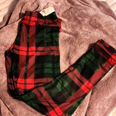 Ladies Plaid Green & Red Leggings Brand New W/Tags Color: Red & Green Plaid Size: Large Trendy Red Non-stretch Leggings, Trendy Non-stretch Red Leggings, Red Fall Leggings For Loungewear, Red Casual Winter Leggings, Red Casual Leggings For Winter, Red Holiday Long Pants, Holiday Red Long Pants, Fitted Holiday Bottoms For Fall, Red Long Pants For Holiday