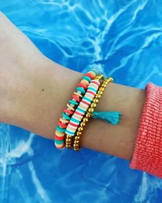 Moana Themed Bracelet Stack - Etsy Multicolor Bohemian Stacked Bracelets, Bohemian Multicolor Stacked Bracelets, Multicolor Stacked Bracelets For Beach, Multicolor Beaded Bracelets For Spring Vacation, Multicolor Wrap Bracelet For Summer Gift, Multicolor Summer Wrap Bracelet Gift, Trendy Multicolor Friendship Bracelets, Trendy Multicolor Beaded Bracelets For Spring, Casual Gold Friendship Bracelets For Spring