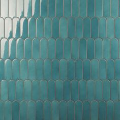 an image of a blue tile wall that looks like it is made out of glass