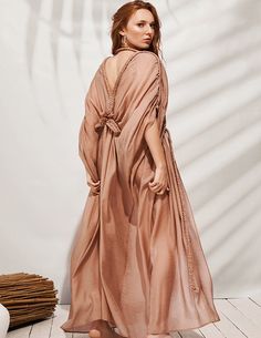 Really divine dress. Fits perfectly into your paradise vacation. Gives a feeling of femininity and freedom. Flowy Resort Dresses, Chic Flowy Dress For Beach Cover-up, Flowy Tunic Dress For Beach Party, Chic Floor-length Kaftan For The Beach, Elegant Floor-length Boho Dress For Vacation, Chic Floor-length Beach Kaftan, Elegant Long Beach Dress As Cover-up, Flowy Resort Beachwear Dresses, Tunic Beach Cover-up Dresses For Resort