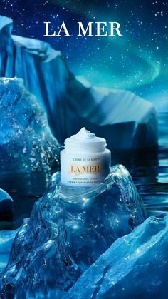 a bottle of la mer on top of ice