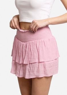 Light pink ruffle tiered mini skirt with elastic waistband 65% Viscose 35% Polyester Size: S/M (14" long), L/XL (15" long) Waist stretch length: 4" Mini Cotton Pink Skirt, Pink Towel Mini Skirt, Luxury Pink Tiered Skirt Sets, Cheap Pink Gathered Skirt, Cheap Lined Tiered Mini Skirt, Cheap Solid Color Tiered Mini Skirt, Cheap Multicolor Tiered Mini Skirt, Cheap Gathered Tiered Mini Skirt, Cheap Pink Mini Skirt With Ruffles