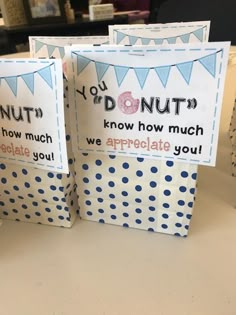 three bags that say donuts and know how much we appreciate to eat you with blue polka dots on them