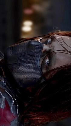 an image of a woman with red hair in the avengers age of ulitu