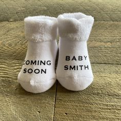 These adorable socks make the perfect baby announcement gift! **Listing is for 1 pair of socks** **Socks do not come pre stuffed** **Font size on socks may very depending on length of name** *Available Sizes:* 0-6 Month, 6-18 Month, 18-36 Month Want a different saying? Just message for a custom order. ~Care Instructions~ Machine wash in cold water with alike colors, do not bleach, hang to dry or tumble dry on low heat. Personalized White Socks Gift, Cute White Booties For Gift, Cute White Booties As A Gift, Cute White Booties As Gift, Baby Coming Soon, Baby Christmas Gift, Baby Christmas, Baby Coming, Welcome Baby