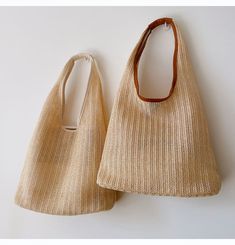 Lightweight straw woven tote bag perfect for all occasions. Size approximately 34cm wide x 25cm tall (13in x 10in) Designer Style ID: 8303 Beige Large Capacity Bag In Natural Fiber, Large Capacity Beige Bag In Natural Fiber, Open Weave Jute Shoulder Bag With Double Handles, Double Handle Jute Shoulder Bag With Open Weave, Open Weave Double Handle Jute Shoulder Bag, Chic Handwoven Straw Hobo Bag, Beige Crochet Bucket Bag With Braided Handles, Beige Woven Straw Shoulder Bag, Neutral Straw Tote Bag For Shopping