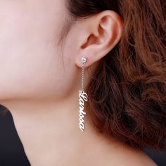 Font:Birthstone:Dainty Name Earring is a unique look that you should have on your jewelry collection. Features a long drop chain and an inscription or nameplate, it is a mainstream fashion. Engraving your name and your lover's name to highlight your personality and unique style. Wear them anytime, anywhere, or give them as a thoughtful gift to a friend or a loved one. Personalized Sterling Silver Earrings As Gift, Custom Name Dangle Earrings, Silver Name Earrings For Gift, Silver Earrings With Name For Gift, Elegant Personalized Name Earrings, Custom Name Silver Earrings For Anniversary, Custom Name Silver Nameplate Earrings, Silver Dangle Jewelry With Custom Name, Silver Personalized Name Earrings For Gifts