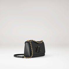 LOUIS VUITTON® - Twist Mm - Black Lv Twist, Bag Collection, Louis Vuitton Official, Bag Luxury, Louis Vuitton Twist, Black Leather Handbags, Gucci Mules, Color Dorado, Chain Bags