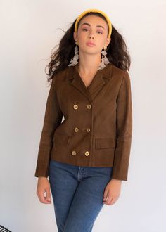 "Vintage 60s Mod suede jacket. Subtle suede double-breasted jacket in a chocolate brown. Notched lapel. Long sleeves. Front flap pockets. Boxy silhouette. Decorative Mod square front button fastening. Fully lined. We kindly ask that you please view all measurements for comparison so you can get your desired fit. Made in Spain. * Brand: Maema, Madrid * Decade: 1960s * Fabric: Suede * Lining: Acetate * Color: Chocolate Brown C O N D I T I O N Excellent vintage condition, minimal pre-wear; no major Brown Double-breasted Blazer With Buttons, Brown Suede Leather Jacket With Lapel Collar, Brown Suede Blazer For Work, Brown Double-breasted Blazer For Fall, Brown Leather Jacket With Double Button For Work, Brown Suede Leather Jacket For Work, Brown Leather Jacket For Work, Chic Brown Double-breasted Blazer, Brown Blazer With Snap Buttons And Lapel Collar