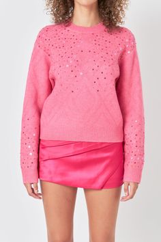 Stand out with this Sequins Knit Sweater - perfect for any occasion! Show off its unique features: knitted construction ribbing oversize fit and a thrilling braided trim adorned with glimmering sequins. This chic sweater will make you feel light and mesmerizing and guarantee to draw attention wherever you go. Enjoy maximum comfort and breathability while being the envy of anyone who sees you in it! Get ready to dazzle with this must-have knit piece. Braided trim Knit Ribbing Oversize fit Beading