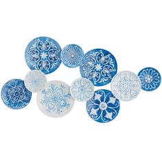 blue and white decorative plates arranged in a circle